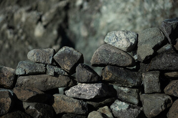 A neatly balanced rock wall.