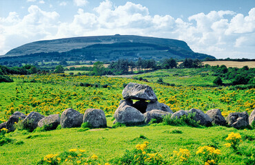 Carrowmore prehistoric Neolithic cemetery, Grave 7, with Queen Maeve's cairn on summit of...