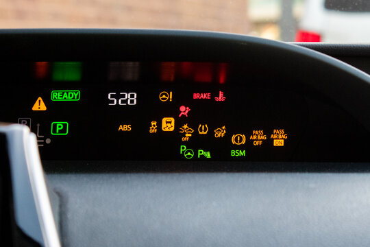Car dashboard with all warning lights turned on 