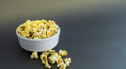Popcorn lovers day concept , march 9th white colored bowl with popcorn Selective focus
