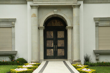 Entrance of house with beautiful arched door