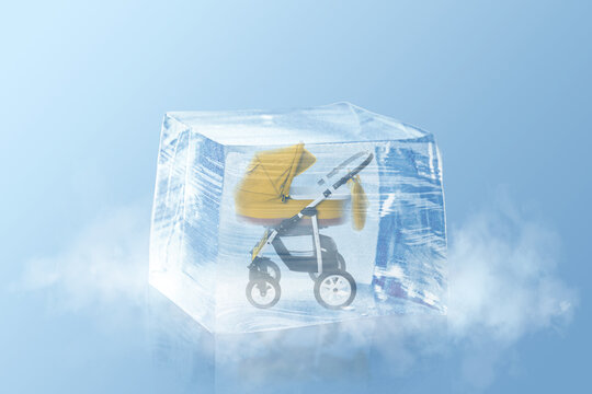 Conservation of genetic material. Baby carriage in ice cube as cryopreservation on light blue background