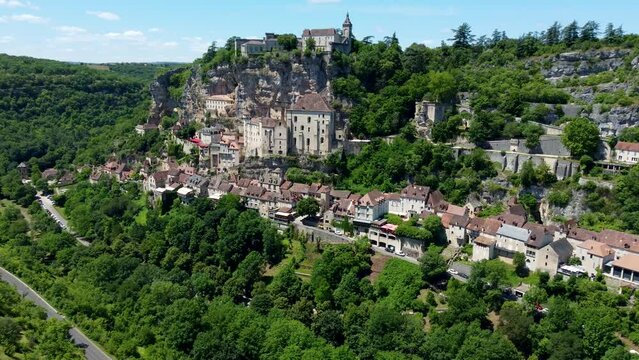 4K aerial footage of the beautiful hilltop town of Rocamadour, which is a commune in the Lot department in Southwestern France.