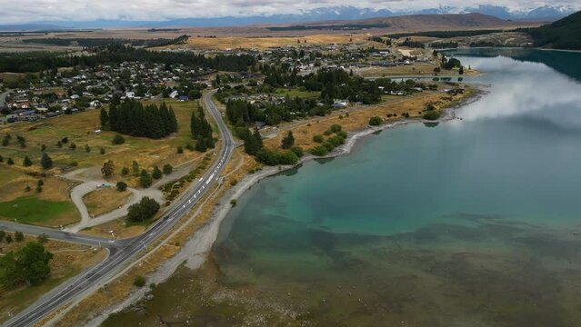 Lake Tekapo and small town in New Zealand, aerial drone view