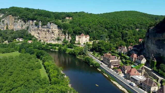 Smooth 4K footage heading up the river in La Roque-Gageac, which is is a commune in the Dordogne department in Nouvelle-Aquitaine, southwestern France.