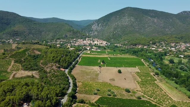 4K aerial footage approaching Roquebrun, a commune in the H&eacute;rault department in the Occitanie region in southern France.