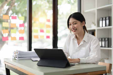 Fototapeta premium Accountant woman working on laptop and do document, tax, exchange, accounting and Financial advisor concept
