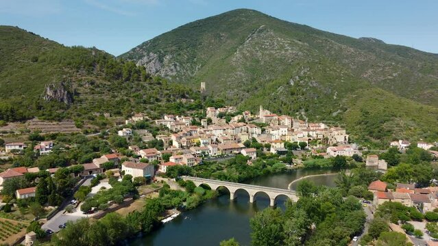 4K aerial footage of Roquebrun, a commune in the H&eacute;rault department in the Occitanie region in southern France.