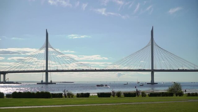 Modern cable-stayed bridge. A road across a river or sea. WHSD - western high-speed diameter in St. Petersburg, Russia. Yachts and boats are sailing.