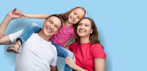 Obraz premium Happy young family with child posing