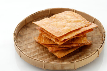 Kerupuk Bawang or Crsipy Fried Dumpling Skin.