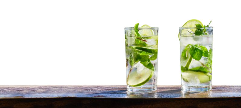 two mojito cocktails on wooden bar copy space composition with isolated background