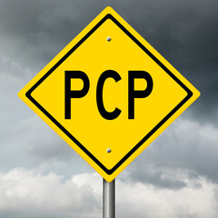 Diamond-shaped yellow highway sign with substance abuse warning