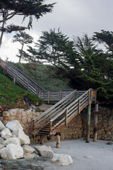 A view on the stairs to the beach at Pacific ocean shore, CA