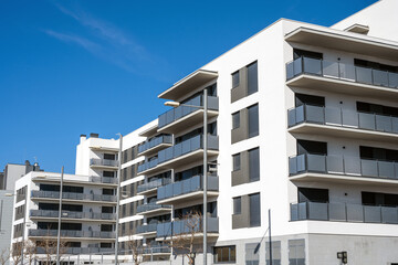 New white apartment building with balconies seen in Barcelona, Spain - 579235215