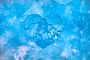 View of frozen heart shape on ice surface