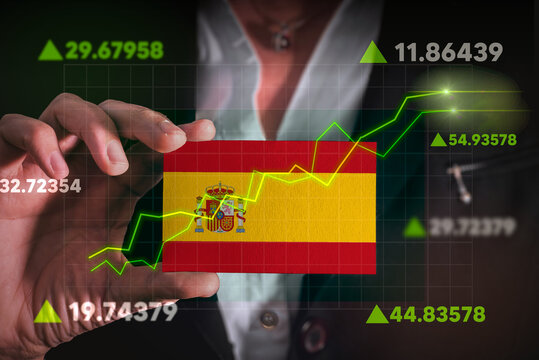 Graph growing up in Front Of Spain Flag. business state growing up concept.
