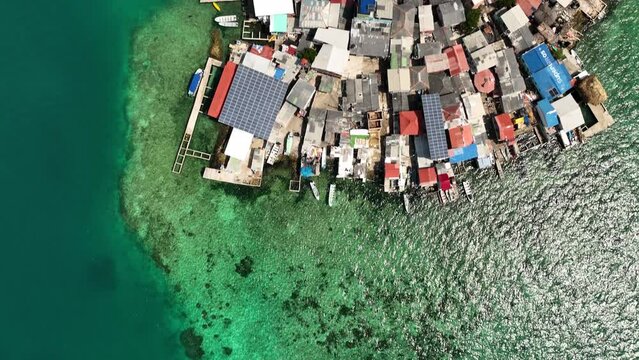 Santa Cruz Del Islote, Colombia. Top Down Aerial View of Island Fully Packed With Buildings, High Angle Drone Shot