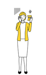 預金通帳を見て落ち込む定年退職したシニア・中年女性