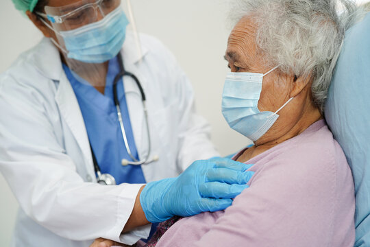 Doctor Check Asian Elder Senior Woman Patient Wearing A Mask For Protect Covid Coronavirus..