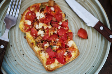 Delicious Brunch Toast, topped with tomato, tuna and cheese