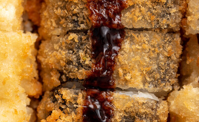 Baked Japanese rolls as background.