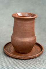 Ceramics, a ceramic product made with their own hands on a potter's wheel, a mug.