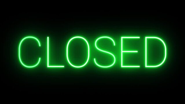 Flickering neon green glowing closed sign illuminated black background