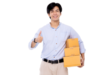 Happy young Asian man thumb up and holding package parcel boxs isolated on transparent background. Delivery courier and shipping service concept. PNG file format