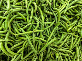 Fresh Green Chilies - Close up Top view at Fresh Market. Very spicy hot Hari Mirchi or Thai Green Chilies