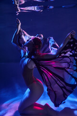 beautiful cosplay girl in a butterfly costume with wings fantasy cyberpunk