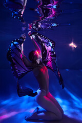beautiful cosplay girl in a butterfly costume with wings fantasy cyberpunk