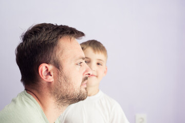 children and father study together