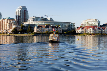 Passenger Ferry in Victoria, BC Inner Harbour or Harbor at golden hour travel and tourism
