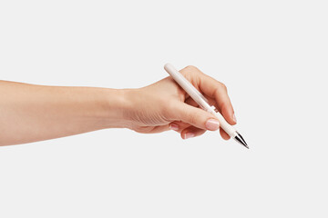 a woman's hand holding a pen