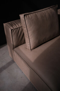 leather detail of sofa - minimalist upholstered furniture