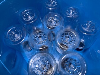 blue glass bottle, Photo of the bottom of the bottle in the blue bucket.