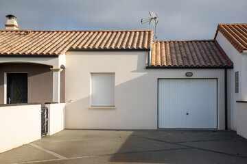 modern private house suburb with garage gate overhead door entrance