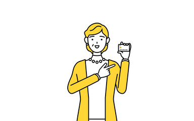 クレジット決済を勧める定年退職したシニア・中年女性