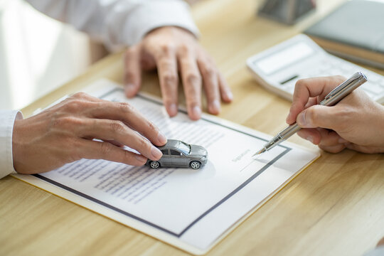 Loss Adjuster Insurance Agent Inspecting Damaged Car. .Sales Manager Giving Advice Application Form Document Considering Mortgage Loan Offer For Car  insurance