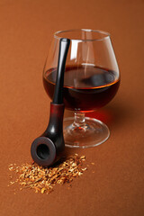 Concept of relaxation, smoking tobacco with smoking pipe