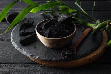 Natural wood or hardwood charcoal on wooden table