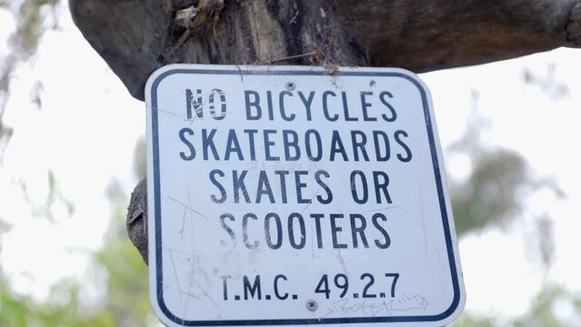 No bicycles and scooters sign in the park
