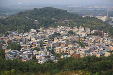 Fototapeta na wymiar Village of new territories, yuen long near Industrial Estate in aerial view