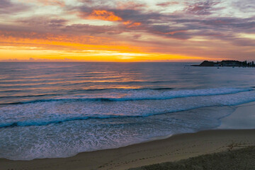 Sensational high cloud sunrise at the seaside