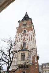 Krakow Main Square Rynek Glowny Poland. Krakow architecture, old city architecture. Historic Roman Catholic church in Krakow Baroque architecture Travel tourist attraction 