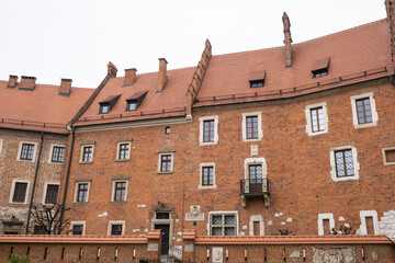 Royal Wawel royal castle in Krakow in rainy early spring weather in Poland. historic castle in the old city Gardens and cathedra, Cracow, Poland. Travel attraction tourist destination