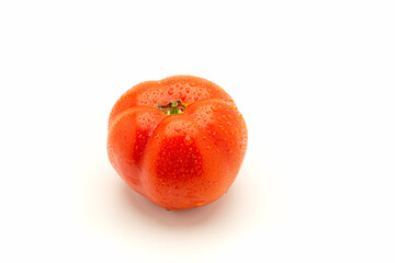Fresh tomato on a white background
