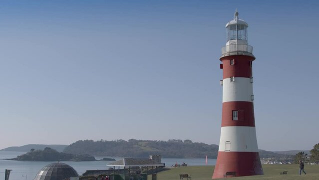 A wide view of Smeatons Tower in Plymouth, Devon on a bright sunny day.