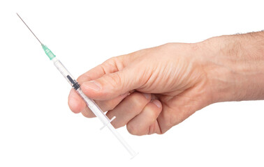 New syringe in adult hand on white background